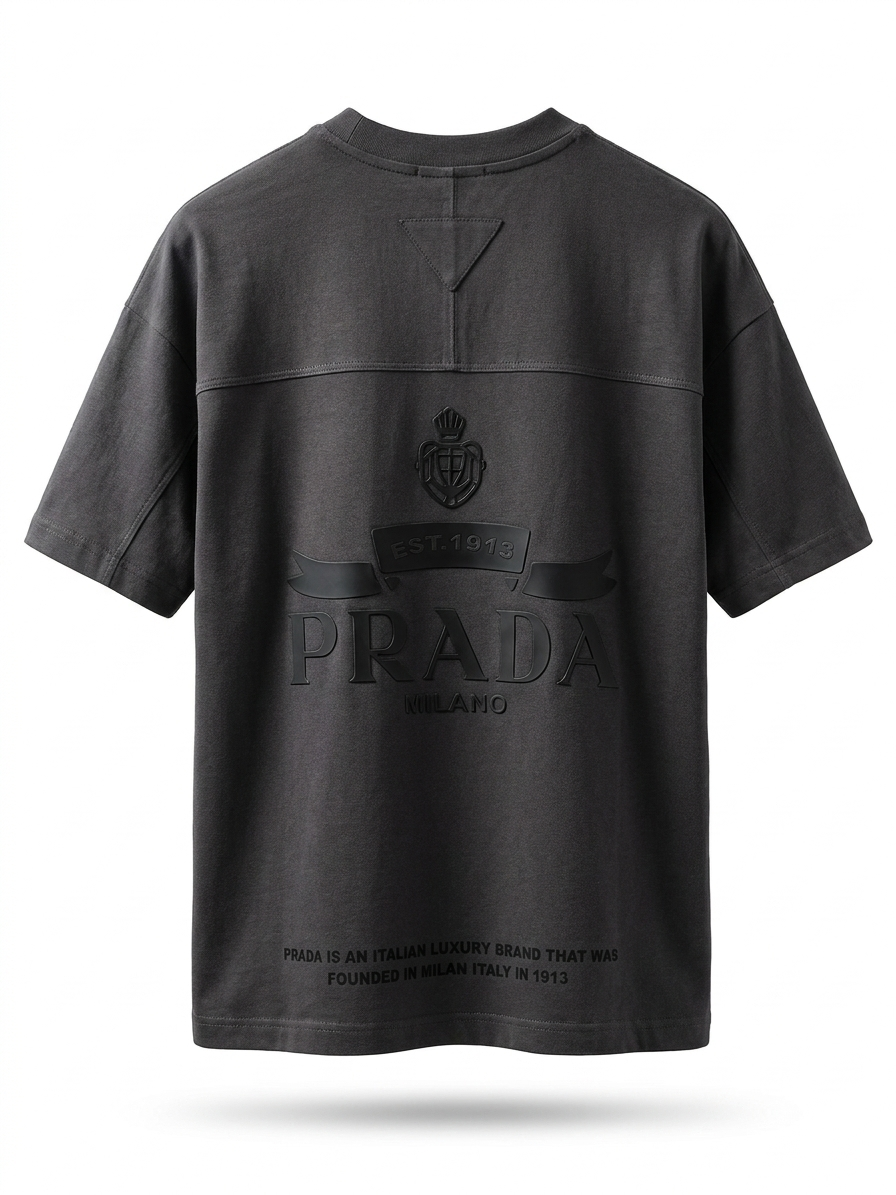 The P. Signature-Emblem Oversized Tee in Deep Charcoal.