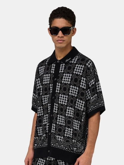AM Geometric Jacquard Knit Polo in Black