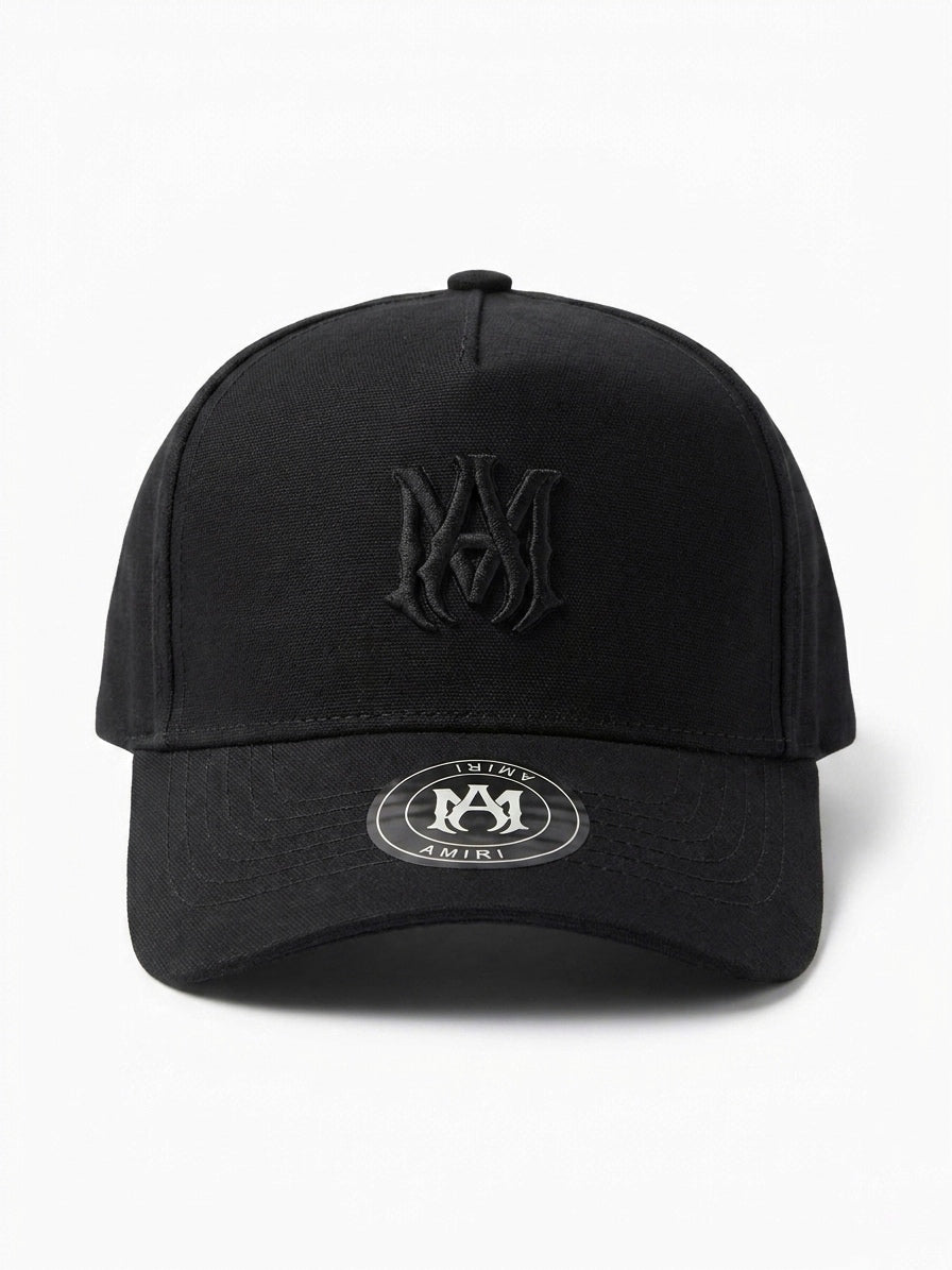 AM | Onyx Monogram Trucker